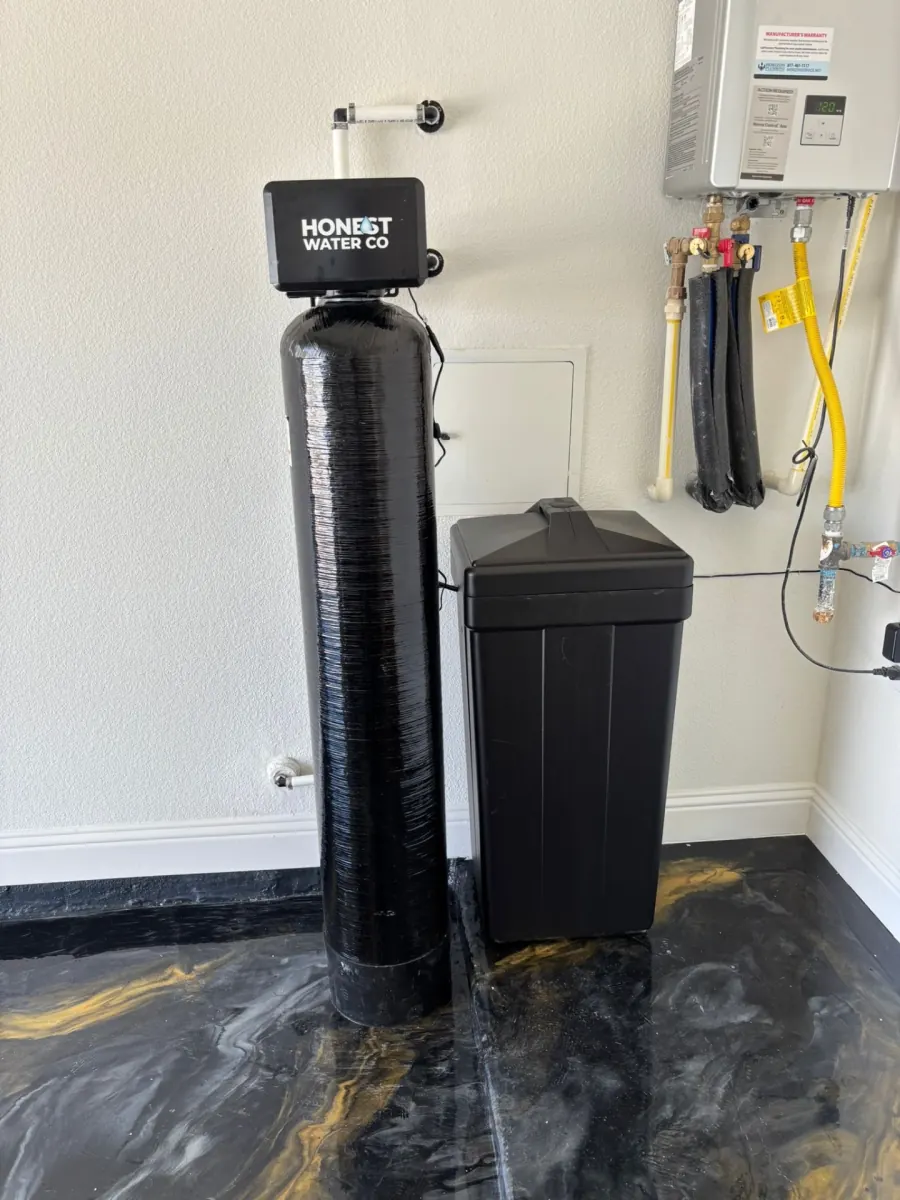 Honest Water softener and brine tank installed in a garage